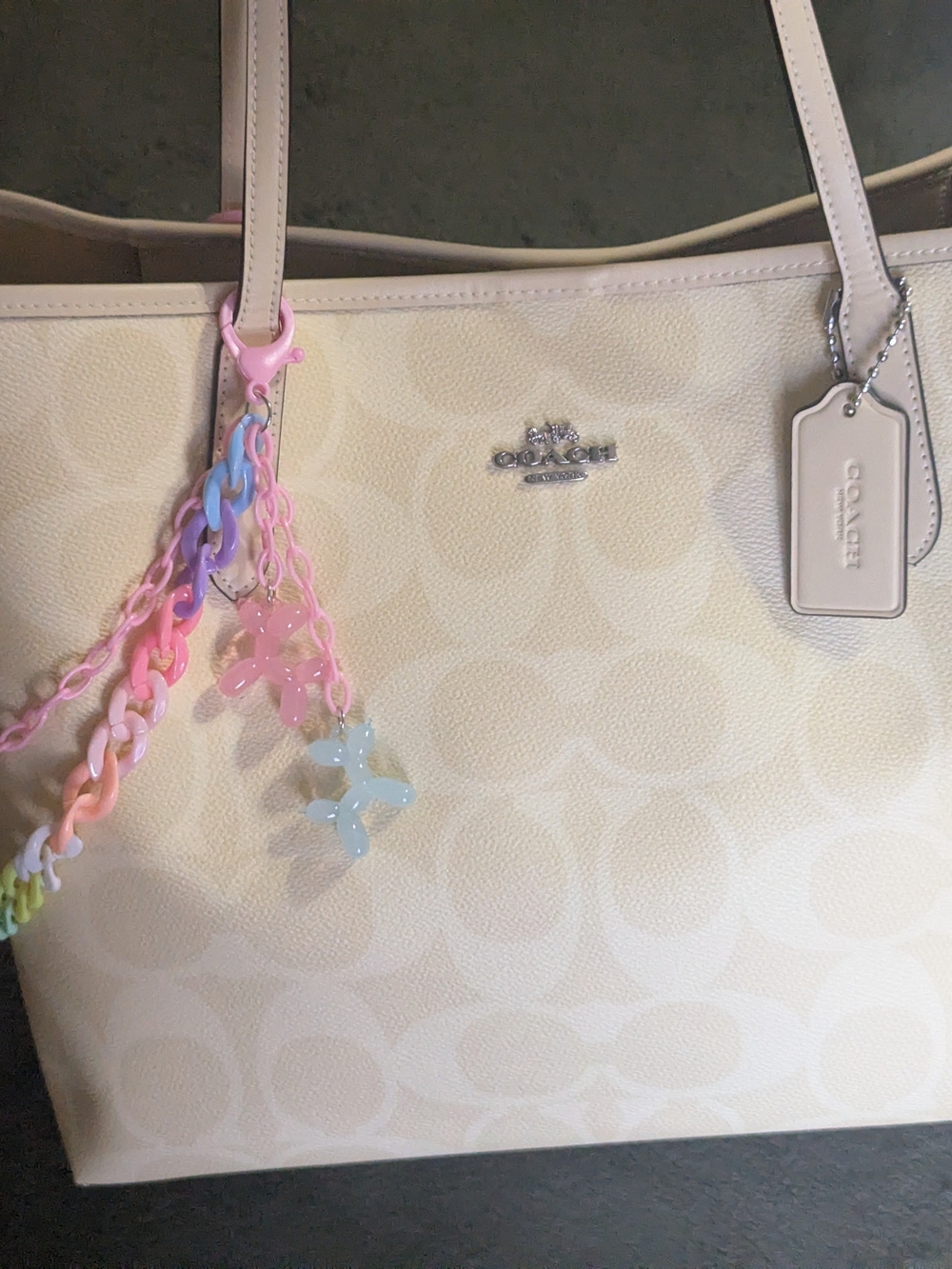 SOLD❌❌COACH Cream Signature Tote with Pastel Charm and wallet